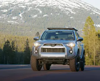 SUV in a national forest parking lot.
