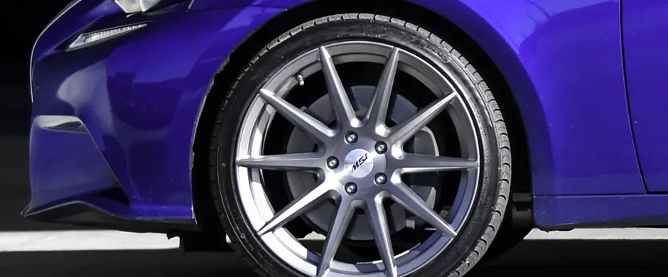 Performance or summer tires on a luxury vehicle.