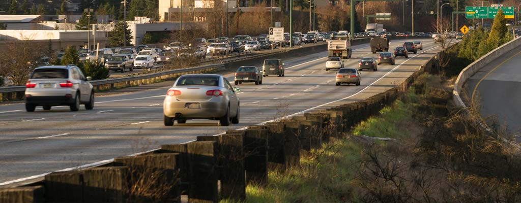 Highway with cars driving on it