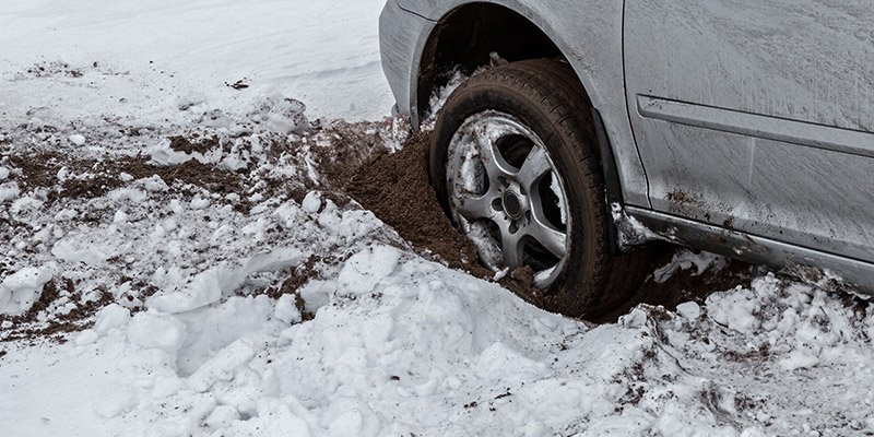 Car stuck in muddy snow