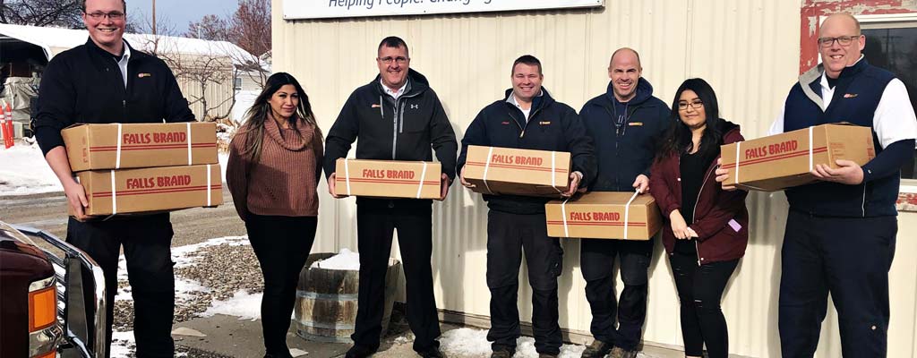Les Schwab managers delivering hams to South Central Community Action Partnership in Idaho’s Magic Valley