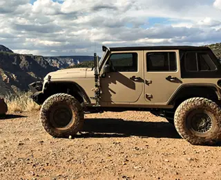 Lifted Keep stopped at a  scenic overlook