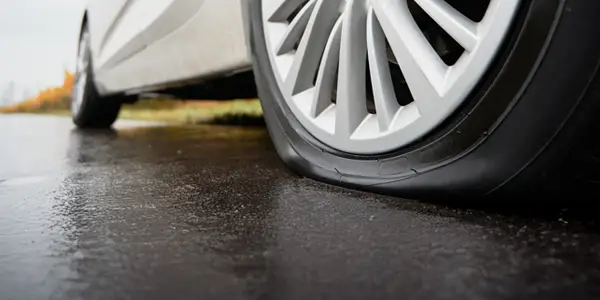 Car with a flat tire