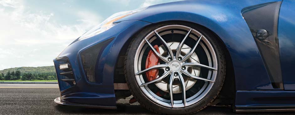Closeup of a custom Niche wheel on a car.