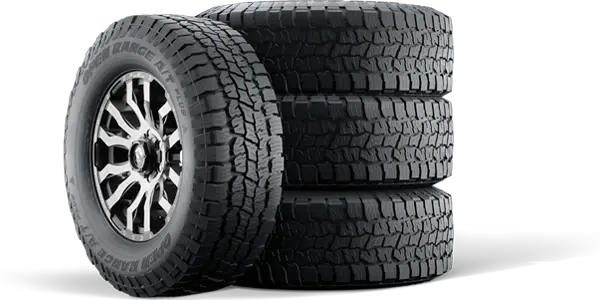 Stack of Open Range A/T Plus Tires