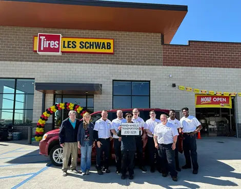 Handi-Wheels Transportation team and van with Les Schwab team
