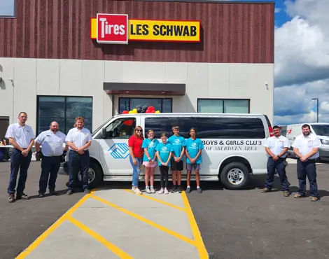 Aberdeen Boys and Girls Club accepting a Tires for Purpose Donation from Les Schwab employees 