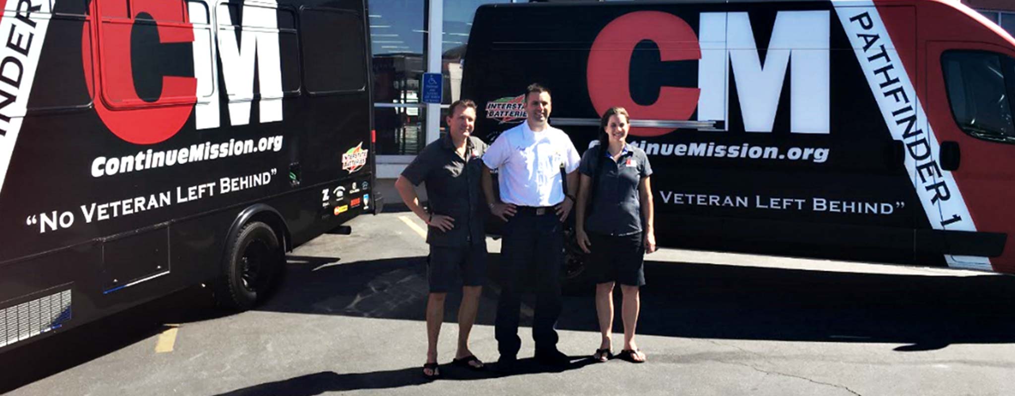 Sargent Josh Hansen and wife Melissa pose with Les Schwab manager.